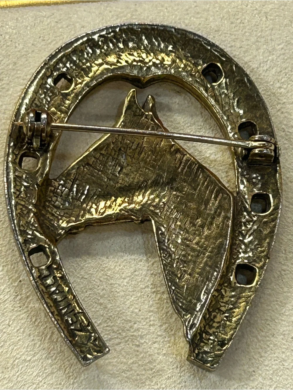 Vintage Zenith horseshoe brooch